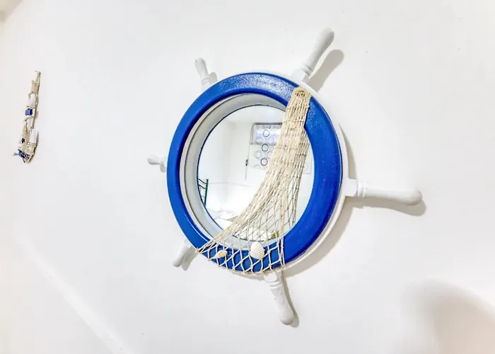 Trilocale Leucos 度假居 *